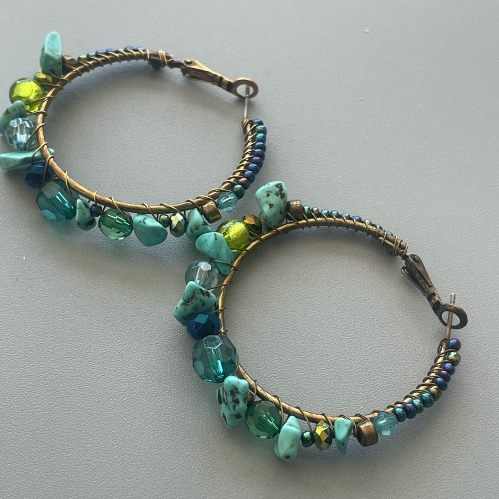 Turquoise and glass wire wrapped beaded pierced hoop earrings.